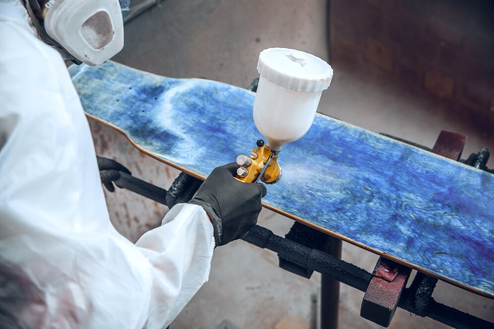 master-painter-factory-industrial-painting-wood-with-spray-gun